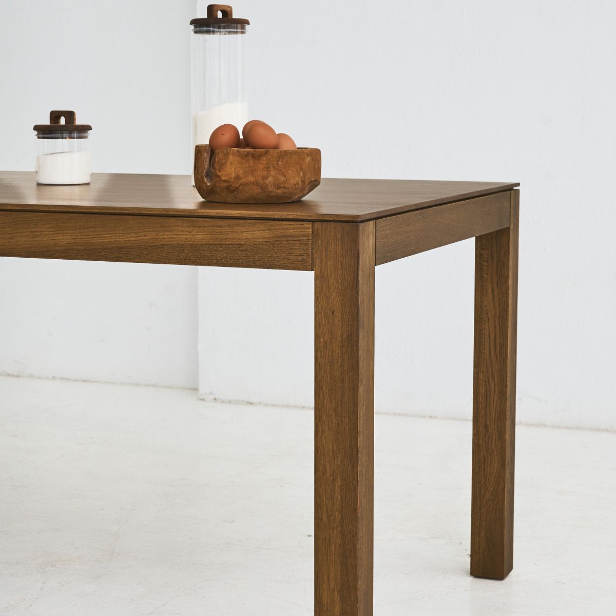 Detail of BRAN solid oak tabletop with geometric precision and natural finish