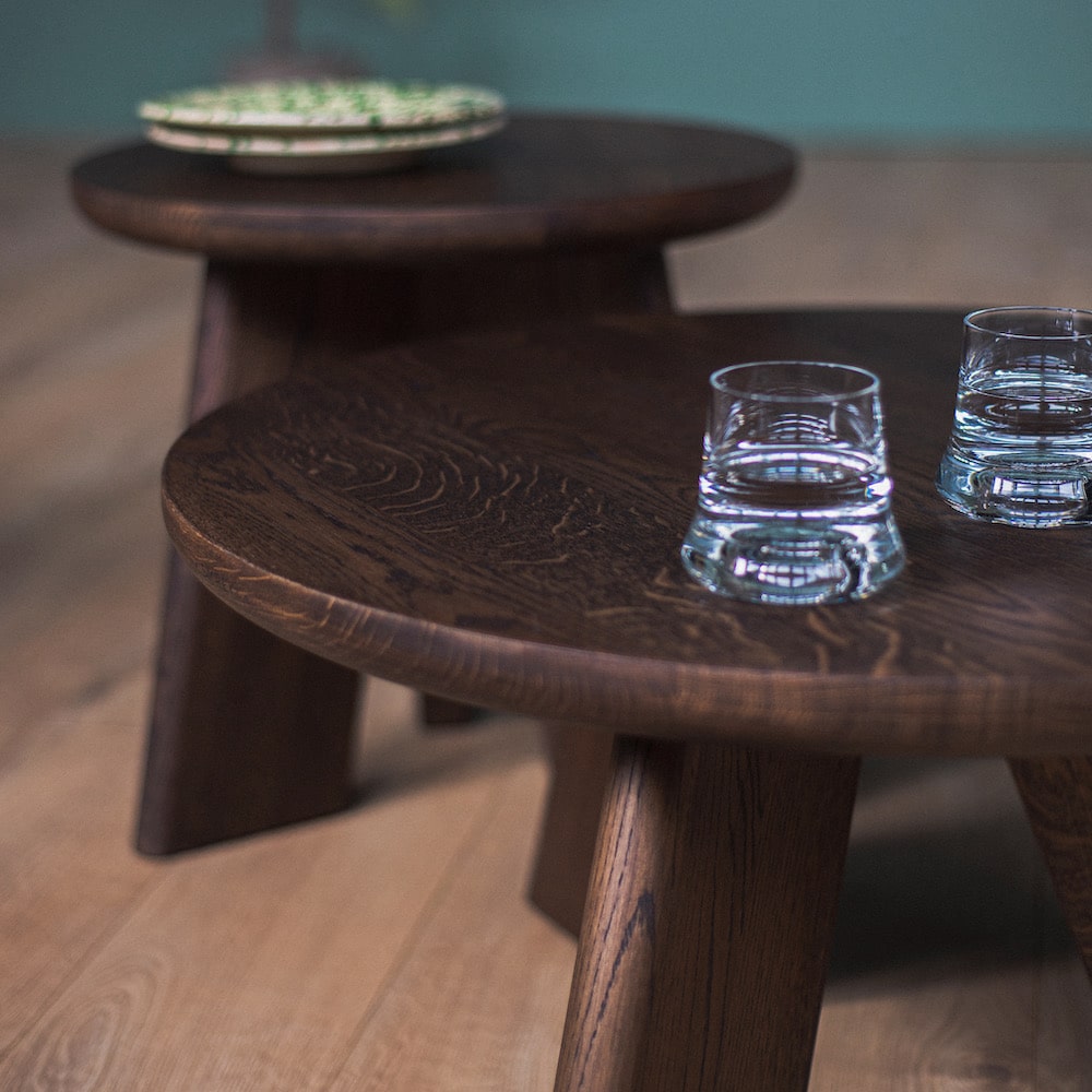 Round oak coffee tables SK5 OVO with softly curved tops and clean lines