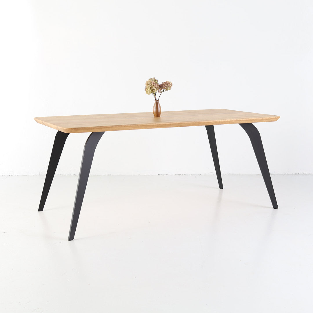 Modern solid oak table ST 2 combining wood and steel in minimalist form