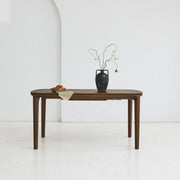 SEVA solid oak dining table with rounded shapes and flowing lines
