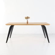 ST 2 solid oak dining table with thick wooden top and metal base