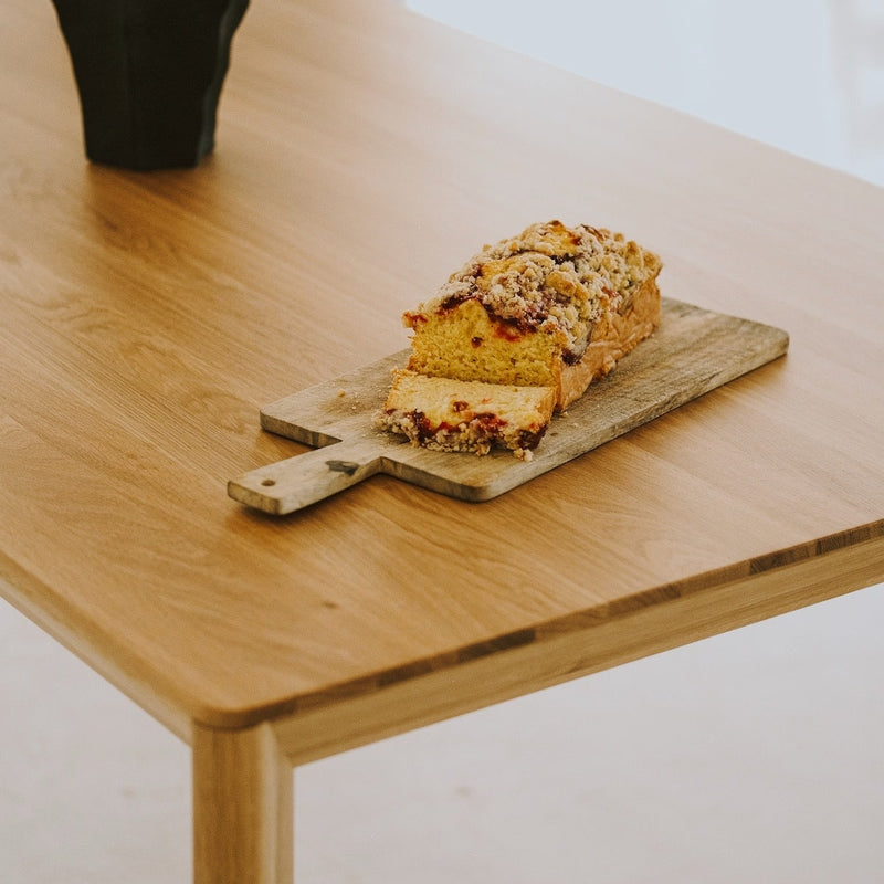 Modern LUVIO dining table combining solid oak structure with delicate proportions