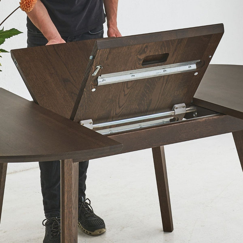 Handcrafted round oak dining table OLMA – elegant and space-saving