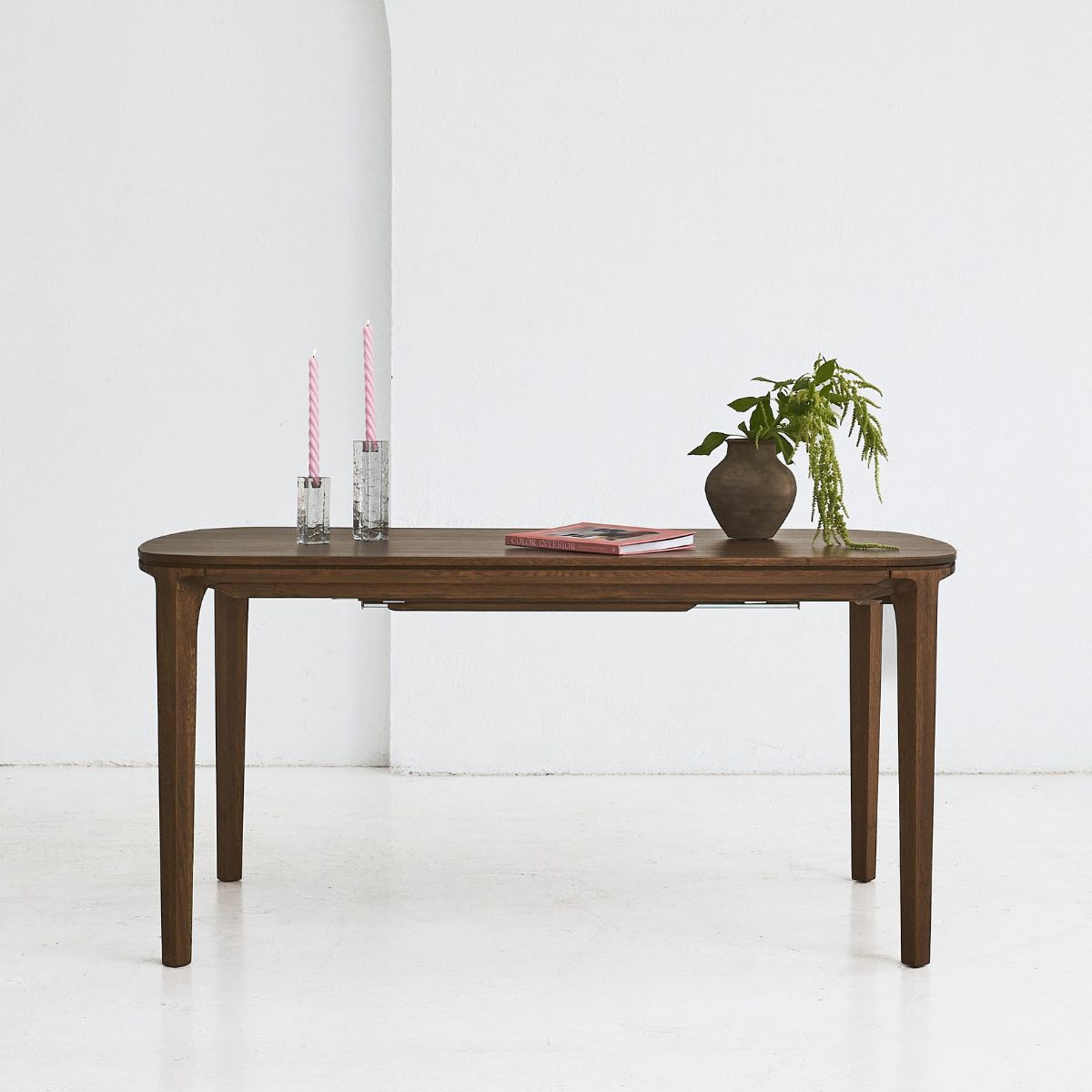 Close-up of SEVA tabletop showing natural grain and fluid silhouette