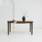 SEVA solid oak dining table with rounded shapes and flowing lines