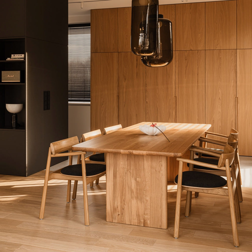 ST 16 OVO solid oak dining table with rounded corners and curved edges