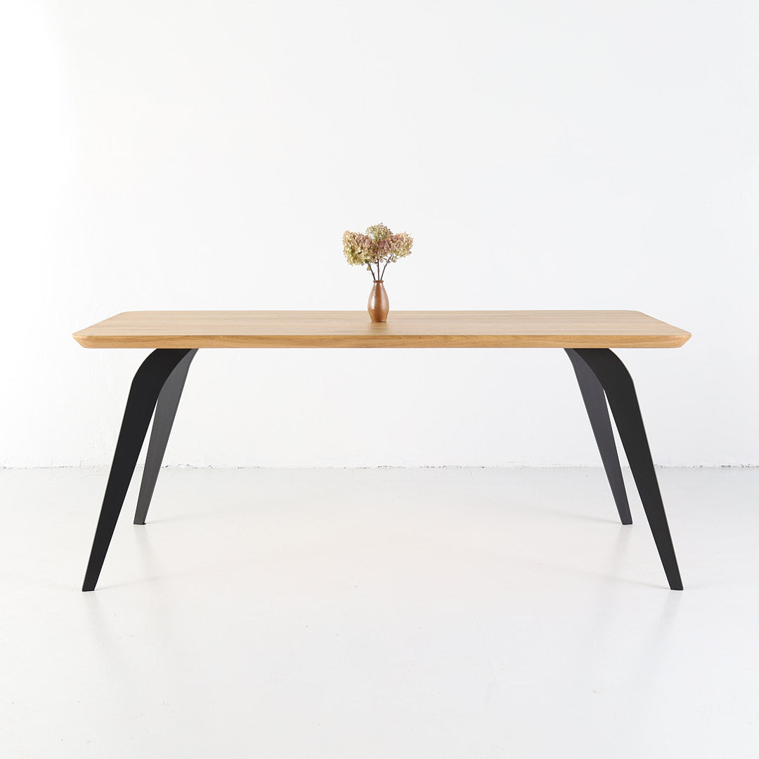 ST 2 solid oak dining table with thick wooden top and metal base