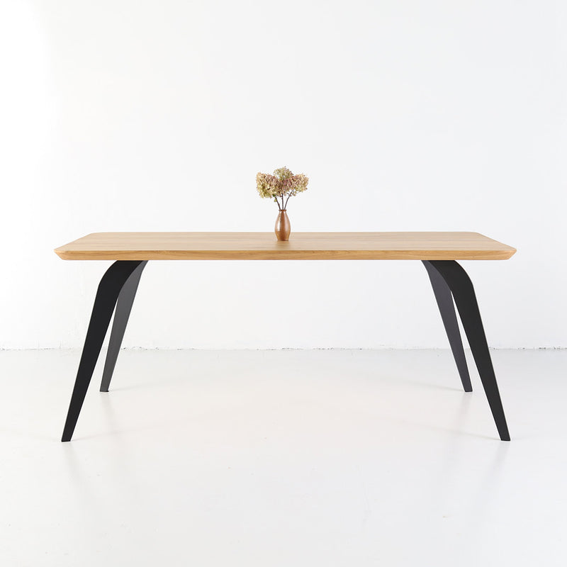 ST 2 solid oak dining table with thick wooden top and metal base