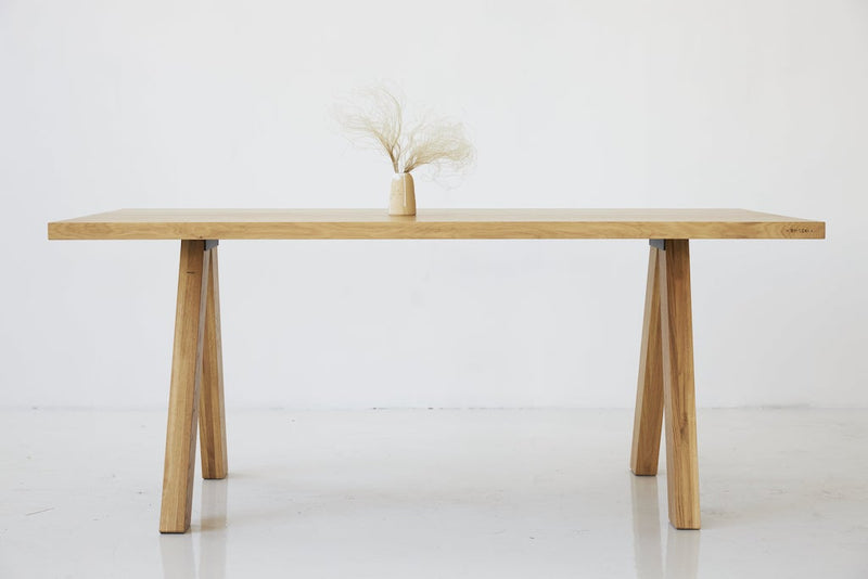 ST 11 wooden dining table with timeless shape and natural warmth