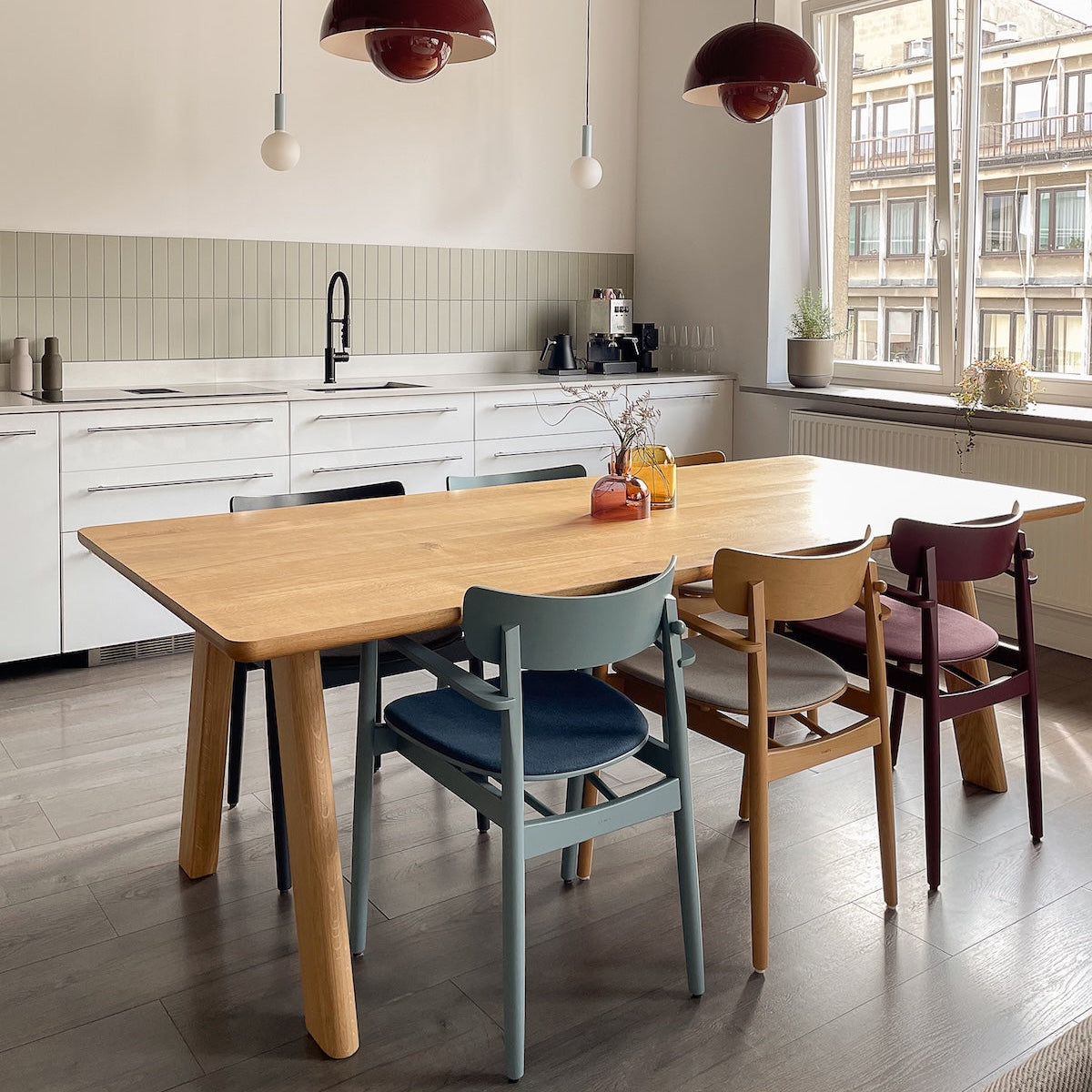 Elegant solid oak table with soft curves and natural wooden finish – ST 17