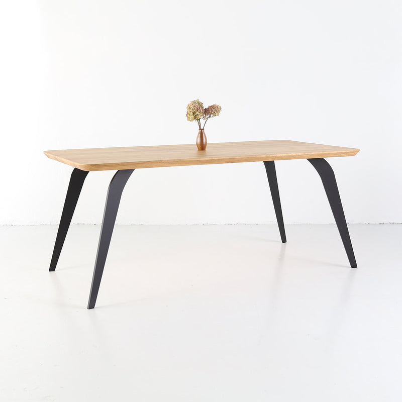 Modern solid oak table ST 2 combining wood and steel in minimalist form